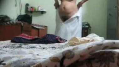 Voyeur of Desi fat aunty stripping