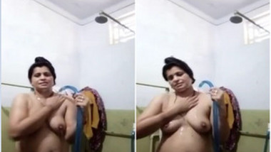 Lonely Indian wife sets camera in the shower room to film some porn