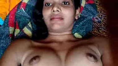 Naked Desi girl lies on bed waiting for sex partner to shove XXX pole in pussy